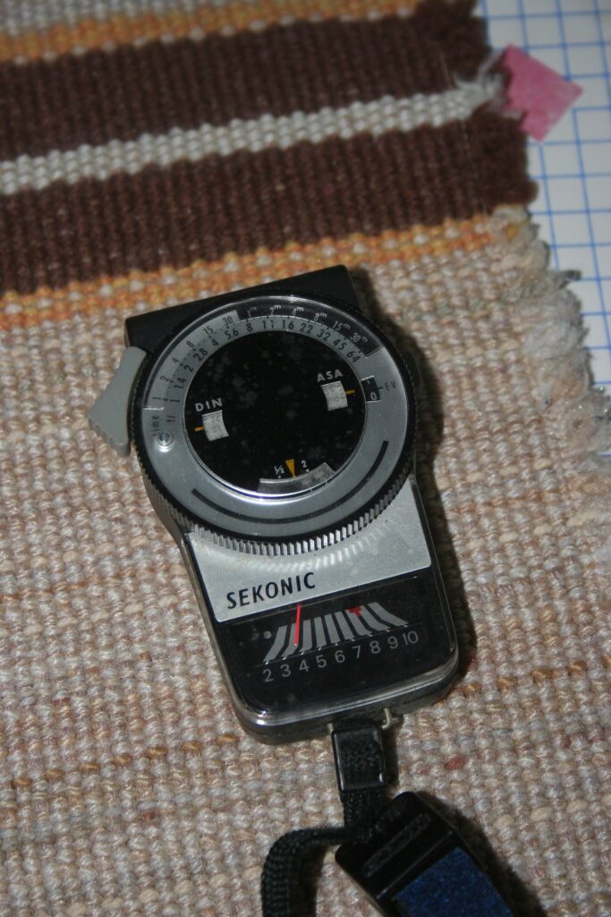 Handheld Sekonic light meter