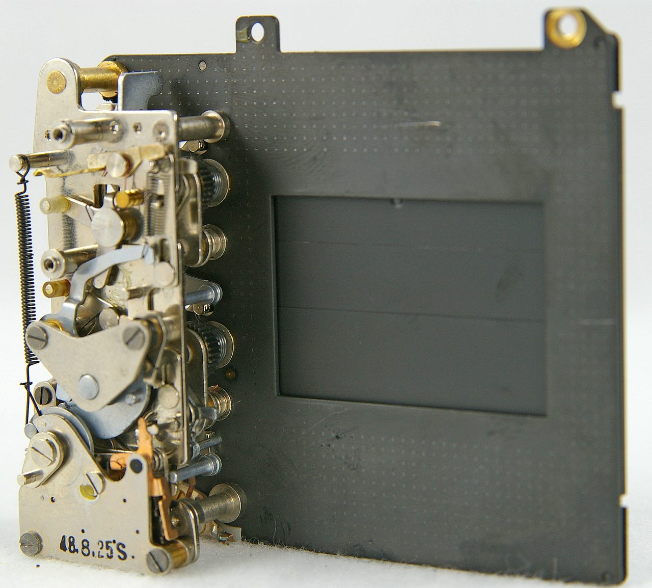 A focal-plane shutter with its two thin metal curtains