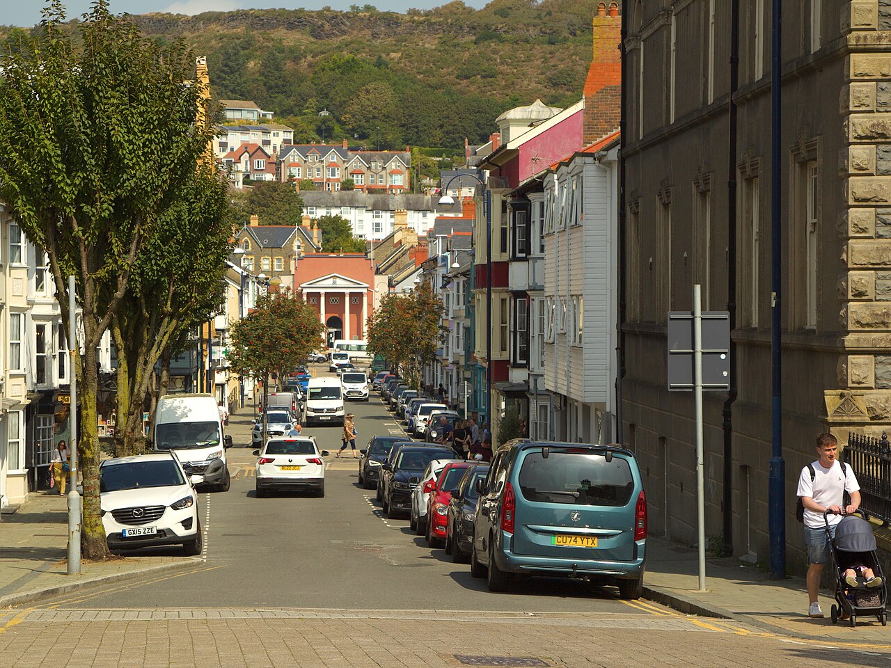Color street scene in Aberystwyth, Wales showing a busy pedestrian street